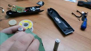 Replacing the rechargeable batteries in a cordless hair trimmer [upl. by Adiesirb878]